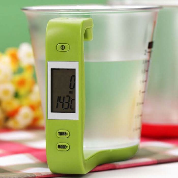 Electronic measuring cup scale showing LCD display for precise ingredient measurement